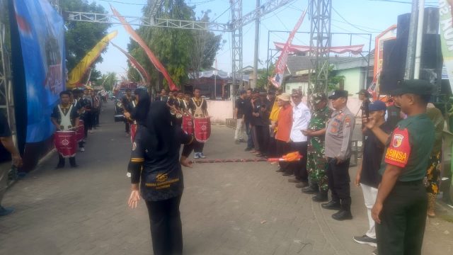 Polsek Solokuro Amankan Karnaval Lembaga Meriahkan HUT ke-81 RI, Drum Band SMK 1 Solokuro Jadi Perhatian