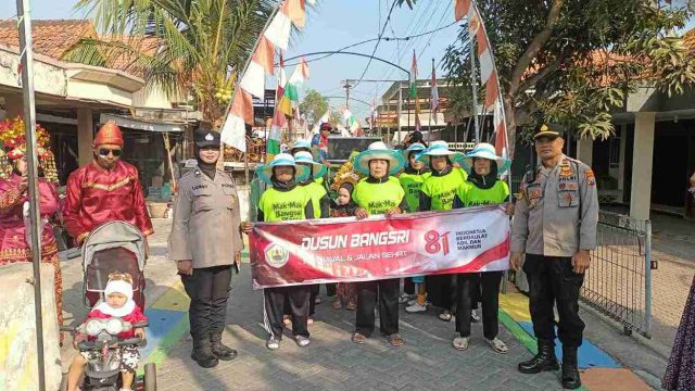 Wakapolsek Deket Hadiri dan Amankan Karnaval Desa Babatagung Lamongan, Pastikan Kegiatan Berlangsung Aman dan Kondusif